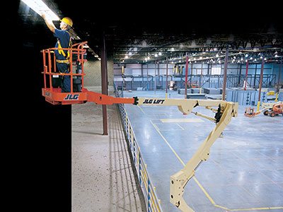 JLG Boom Lift Working in Warehouse