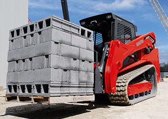 Manitou Skid Steer Lifting Concrete