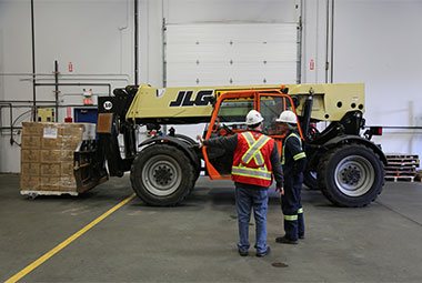 Operator taking a telehandler training course for his certification